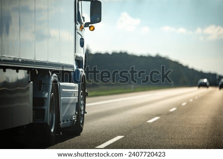 Similar – Image, Stock Photo Car trailer with high blue tarpaulin made of plastic in front of brittle hedge and blue sky on gravel in natural colors in Lemgo near Detmold in East Westphalia-Lippe