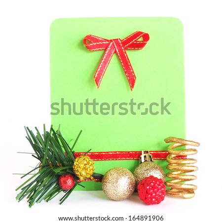 green foam sheet with red ribbon and christmas ball