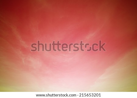 cloud on yellow to red gradient background