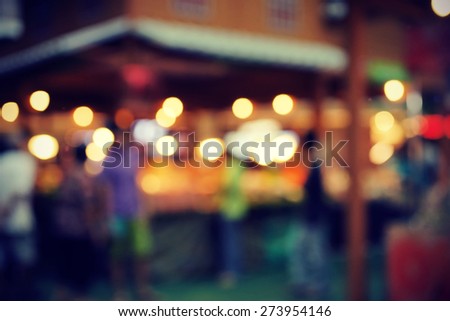 blurred  market with bokeh lights, cross processing film style