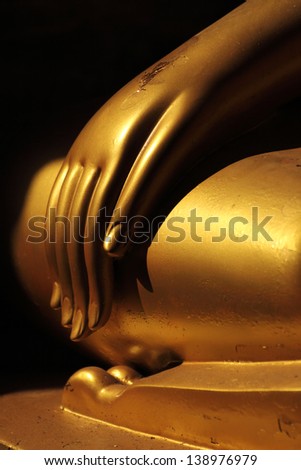 old gold Buddha hands / close up image of old gold Buddha hands