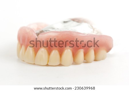 false teeth prosthetic isolated on white background