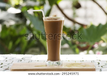 Glass of Thai Coffee smoothie on the table