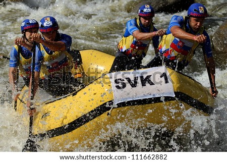 LIPNO, CZECH REPUBLIC - AUGUST 30: Rafters from Slovakia win silver medal in head to head raft 4 competition on European Championship in rafting on August 30, 2012 in Czech Republic