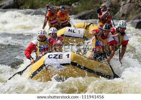 LIPNO, CZECH REPUBLIC - AUG 30: Because of this enthusiasm Czech Rafters win gold medal in head to head raft 4 competition on European Championship in rafting on august 30, 2012 in Czech Republic