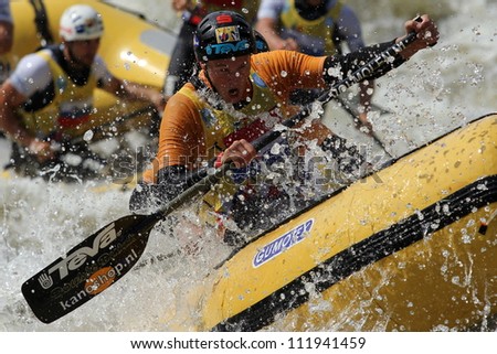 LIPNO, CZECH REPUBLIC - AUG 30: This Rafter from Netherlands win a bronze medal in head to head raft 4 competition on European Championship in rafting on august 30, 2012 in Czech Republic