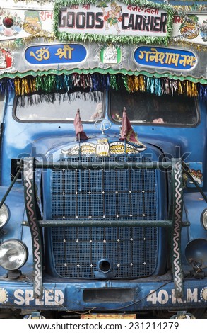 WEST BENGAL, INDIA - CIRCA  2014: Front view of decorated  vintage Indian truck