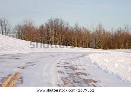 Snow Covered Road with a Right Turn