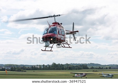 STOW, OHIO - JUNE 12: A Bell helicopter used by a television news crew. Taken at the Kent State University Airport Airshow on June 12, 2009 in Stow, Ohio.