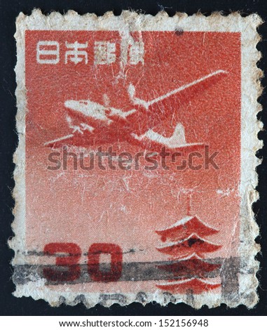 JAPAN - CIRCA 1959: A stamp printed in Japan shows plane above pagoda in temple Horyu-ji, circa 1959