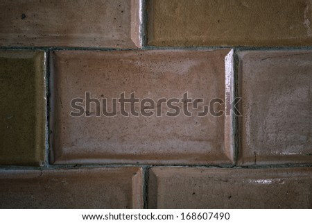 Tiles with tile stove as background