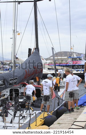 Alicante city - 2 October: ABU DHABI boat crew preparing for a morning training in \
