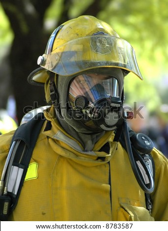 Fireman in protective gear.
