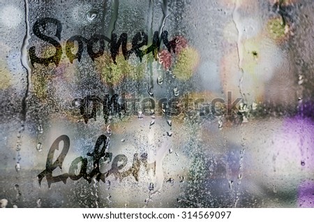 natural water drops on glass window with the text \