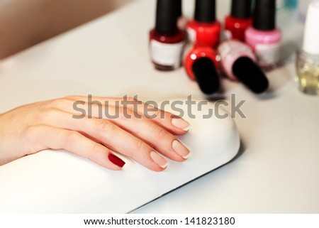 Manicure nail paint pink color