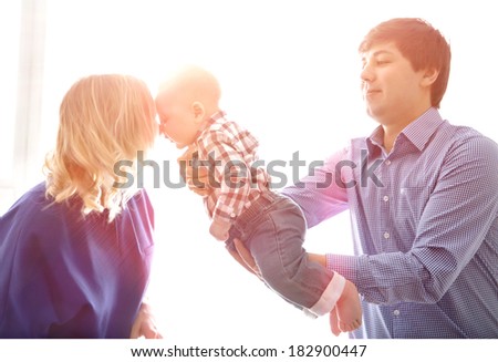 Portrait of a happy family. sun illuminates
