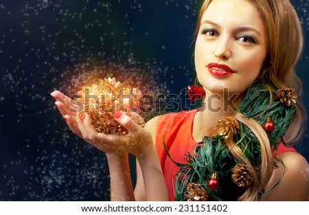 Christmas beauty woman.Holyday make up . False eyelashes,art christmas adornment. Copy space for your text