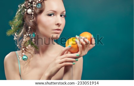 Christmas beauty woman.Holiday make up . False eyelashes,art christmas adornment. Copy space for your text. Toning photo