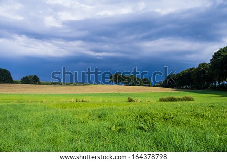 landscape and storm clouds