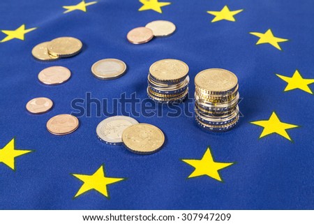 EU flag and Euro coins