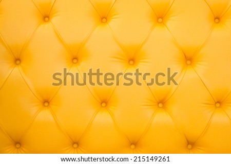 Closeup texture of vintage brown leather sofa for background