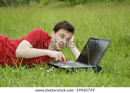 man working on laptop outdoor
