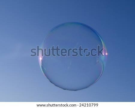 Soap bubble and blue sky