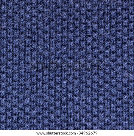 blue polo shirt fabric knit texture. high magnification. perpendicular knit line.