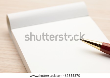 Blank memo pad isolated on white.