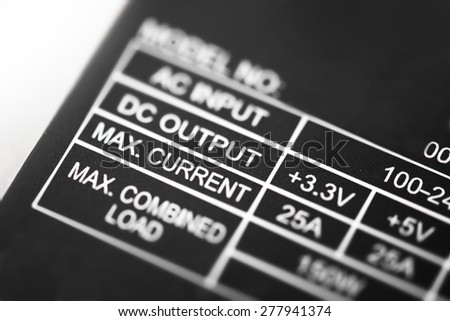 Power rating. Power rating section of a power supply unit. Focus on \