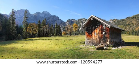 little alpine cabin in the valley bottom of karwendel, panorama landscape in austria
