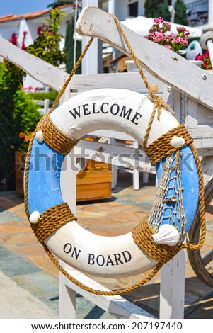 Life buoy with welcome on board on it