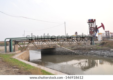 Simple Bridges and industrial pipeline, the oil field oil field drill