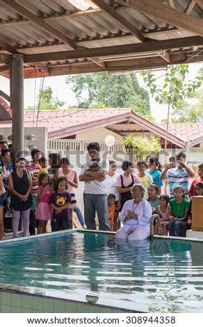 SUPHANBURI, THAI - AUGUST 19 : Holy ceremony in traditional Floating water nun  for Pray