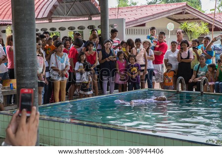 SUPHANBURI, THAI - AUGUST 19 : Holy ceremony in traditional Floating water nun  for Pray