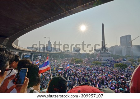 BANGKOK - December 22: Anti government nationalist protesters rally on a city centre street on December 22, 2013 in Bangkok, Thailand. The protesters call for the government to be overthrown.