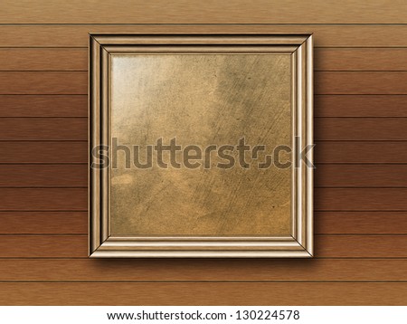 Vintage empty photo frame on wooden wall background.