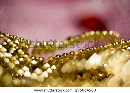 Colorful blurred background of pink and gold color, bokeh effects.