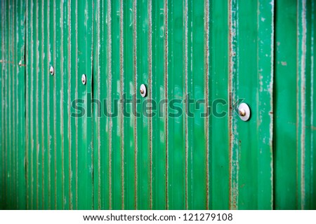 Green metal sheet with bolt
