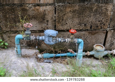 water pipe and meter with old wall