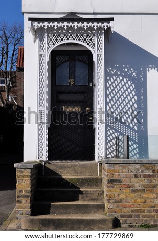 Entrance porch to an early nineteeth century Regency period London town house.
