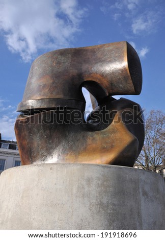 LONDON - MARCH 15. The \'Locking Piece\' cast bronze sculpture by Henry Moore on March 15, 2014; 2.9 metres (9\' 6\
