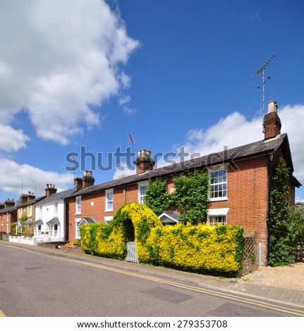RICKMANSWORTH, UK - May 16, 2015. A row of English Victorian period mid to late 19th century houses at Talbot Road, Rickmansworth, a small town in the county of Herfordshire, England, UK.