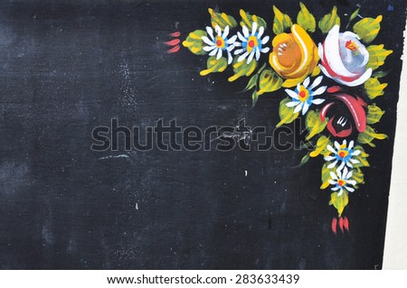 RICKMANSWORTH, UK - MAY 16, 2015. Hand painted flowers decorate a narrow boat mooring along the Grand Union Canal at the town festival in Rickmansworth, England, UK.
