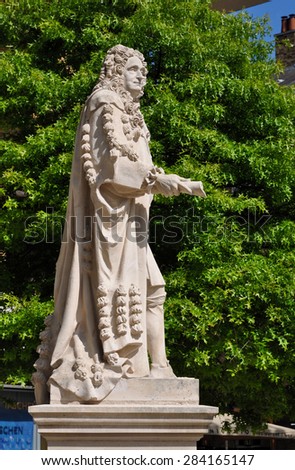 LONDON - MAY 26, 2015. The statue of Sir Hans Sloane (1660-1753) a British physician noted for bequeathing his collection to form the British Museum; located in the Physic Garden, Chelsea, London, UK.