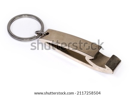 Metal bottle opener in the form of a keychain with attached steel split ring close-up on a white background
 ストックフォト © 