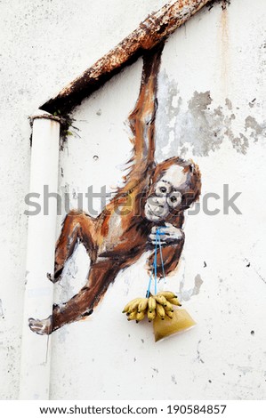 Kuching, Malaysia - April 27: Orangutan wall mural painted by Lithuanian street artist Ernest Zacharevic along Jalan Power, Kuching, Sarawak on April 27, 2014.