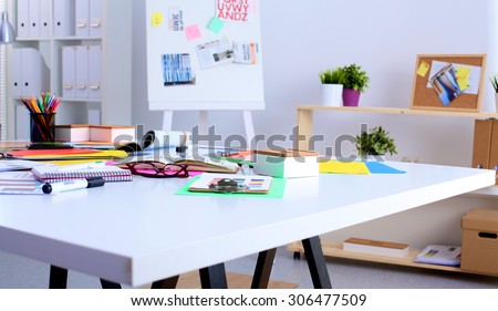 young designer working at his desk with a computer