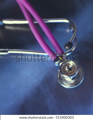 Medical stethoscope in white background