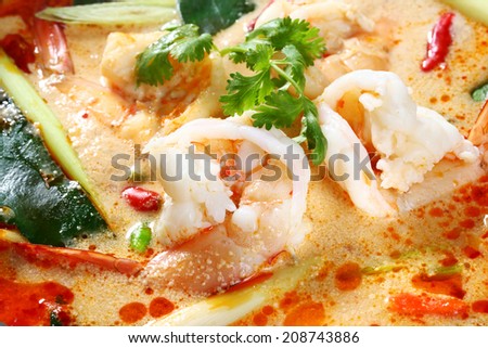 Tom yam koong - Thai spicy prawn or shrimp and lemon grass soup with mushrooms